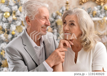 couple old and mature seniors enjoying and having fun together celebrating the new year couple old and mature seniors enjoying and having fun together celebrating the new year 119140920