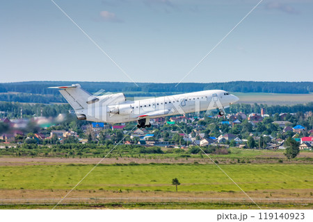 Passenger aircraft taking off in a blue sky Passenger aircraft taking off in a blue sky 119140923