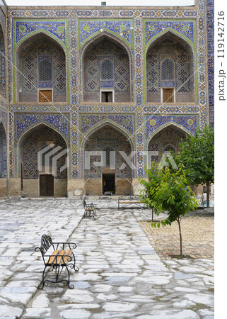 Courtyard of the Ulugbek Madrasah of 14 century in Samarkand, Uzbekistan with decorated portal Courtyard of the Ulugbek Madrasah of 14 century in Samarkand, Uzbekistan with decorated portal 119142716