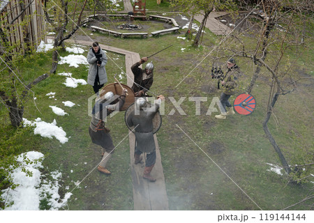 Reenacting Historical Medieval Battle in Outdoor Setting Reenacting Historical Medieval Battle in Outdoor Setting 119144144
