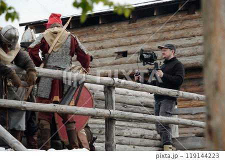 Filming Medieval Scene with Camera Crew and Actors 119144223
