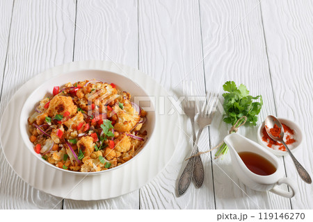 cauliflower chickpea quinoa salad in a white bowl cauliflower chickpea quinoa salad in a white bowl 119146270