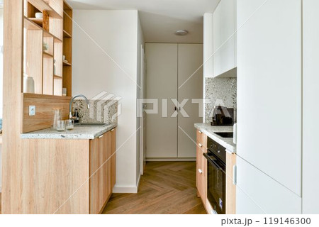 Discover contemporary kitchen design with wooden and white accents enhancing modern living 119146300