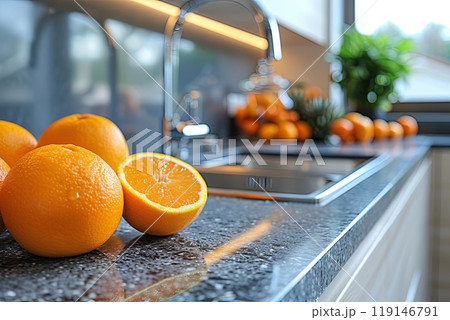 Sink full of oranges and a few other fruits 119146791