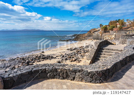 Steps from the promenade to the beach at Playa Blanca 119147427