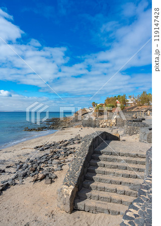 Steps from the promenade to the beach at Playa Blanca 119147428