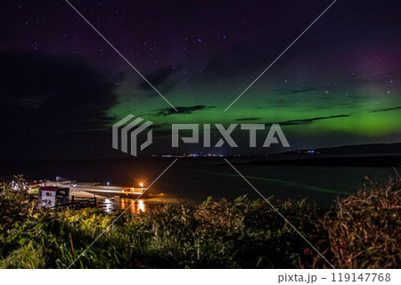 The Aurora Borealis, the northern lights, showing up in Portnoo, County Donegal, Ireland. The Aurora Borealis, the northern lights, showing up in Portnoo, County Donegal, Ireland. 119147768