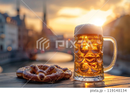 Beer lager at bavarian cityscape. Germany town and alcohol drink. Beer glass and german cityscape on wooden table Beer lager at bavarian cityscape. Germany town and alcohol drink. Beer glass and german cityscape on wooden table 119148134