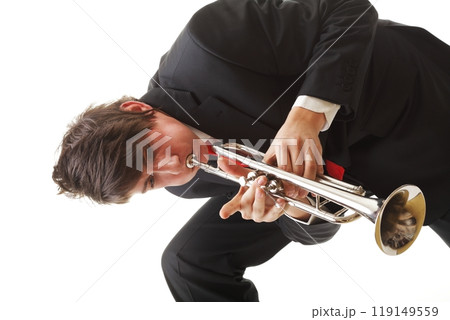 Portrait of a young man playing his Trumpet 119149559