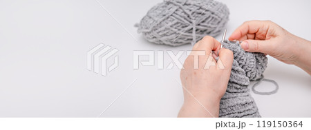 female hands knitting close up 119150364