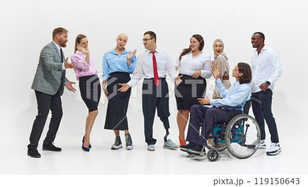 Lively group of diverse people, colleagues engage in animated conversation, with visible enthusiasm, showing inclusion and acceptance in the workplace. Lively group of diverse people, colleagues engage in animated conversation, with visible enthusiasm, showing inclusion and acceptance in the workplace. 119150643