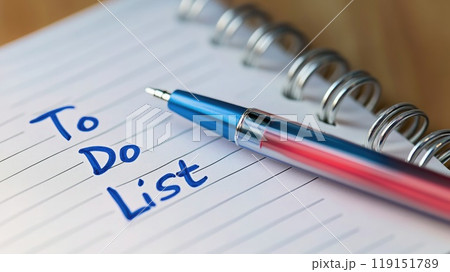 A pen is on top of a to do list 119151789