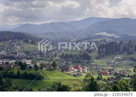 Scenic landscape view of Vorokhta, picturesque mountain village with green hills and forests 119154073