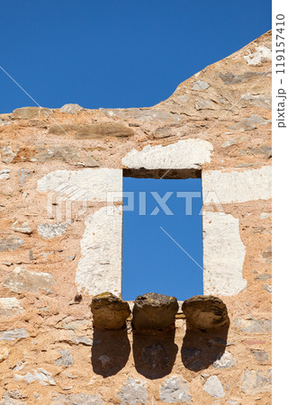 Architecture detail. Old stone wall with window. Architecture detail. Old stone wall with window. 119157410