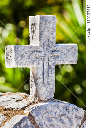 Greek stone cross on burial ground Greek stone cross on burial ground 119157412