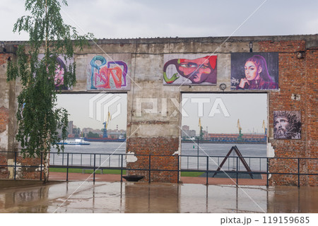 street art on public space Brusnitsyn on the territory of the former factory in rainy weather street art on public space Brusnitsyn on the territory of the former factory in rainy weather 119159685
