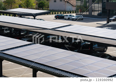 Parking space with solar panels on a roof 119160992