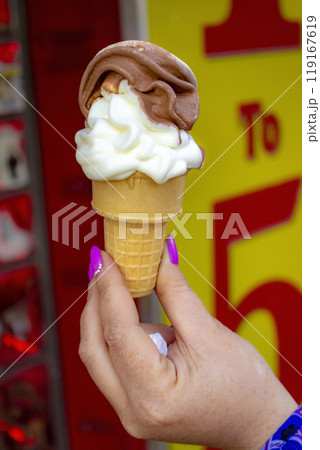 Ice cream in hand Ice cream in hand 119167619