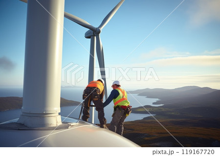 Renewable energy maintenance: skilled workers servicing wind turbine against backdrop of a majestic landscape, dedication, expertise required to sustain clean energy solutions in harmony with nature. Renewable energy maintenance: skilled workers servicing wind turbine against backdrop of a majestic landscape, dedication, expertise required to sustain clean energy solutions in harmony with nature. 119167720
