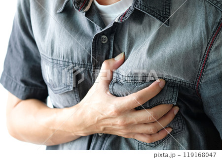 Heart attack, Man standing chest pain in the bedroom Health concept. Heart attack, Man standing chest pain in the bedroom Health concept. 119168047