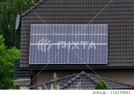 Historic farm house with modern solar panels on roof and wall Historic farm house with modern solar panels on roof and wall 119170081