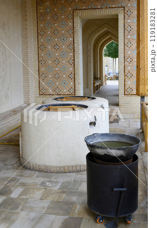 View of an open air kitchen with oven and flowers in Samarkand, Uzbekistan View of an open air kitchen with oven and flowers in Samarkand, Uzbekistan 119183281