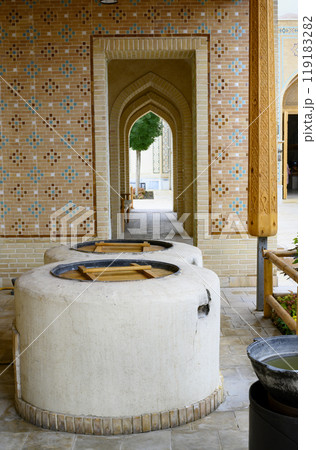 View of an open air kitchen with oven and flowers in Samarkand, Uzbekistan 119183282