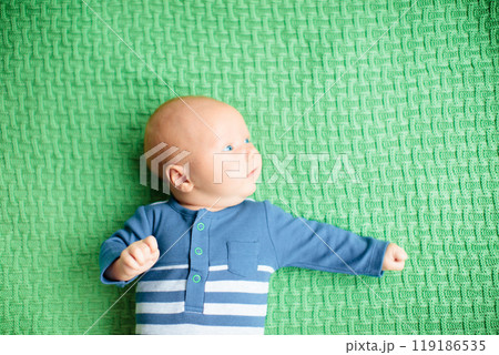 Little baby on colorful knitted blanket Little baby on colorful knitted blanket 119186535