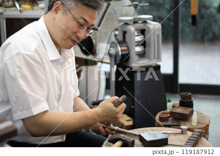 Gyeongsangnam-do, Jinju-si, Republic of Korea, October 11, 2024: Mr. Kim Myeong-su, the CEO of Jeonggeumgil Metalworking, is a person who lends gold to film companies. Gyeongsangnam-do, Jinju-si, Republic of Korea, October 11, 2024: Mr. Kim Myeong-su, the CEO of Jeonggeumgil Metalworking, is a person who lends gold to film companies. 119187912