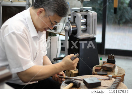Gyeongsangnam-do, Jinju-si, Republic of Korea, October 11, 2024: Mr. Kim Myeong-su, the CEO of Jeonggeumgil Metalworking, is a person who lends gold to film companies. Gyeongsangnam-do, Jinju-si, Republic of Korea, October 11, 2024: Mr. Kim Myeong-su, the CEO of Jeonggeumgil Metalworking, is a person who lends gold to film companies. 119187925