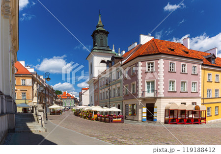 Old street in the historical part of Warsaw on a sunny day. Old street in the historical part of Warsaw on a sunny day. 119188412