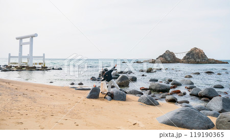 Japanese people selfie at Sakurai Futamigaura couple stones, Itoshima Japanese people selfie at Sakurai Futamigaura couple stones, Itoshima 119190365