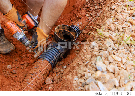 Drainage system damaged by rainwater is being replaced with underground storm sewers. 119191189