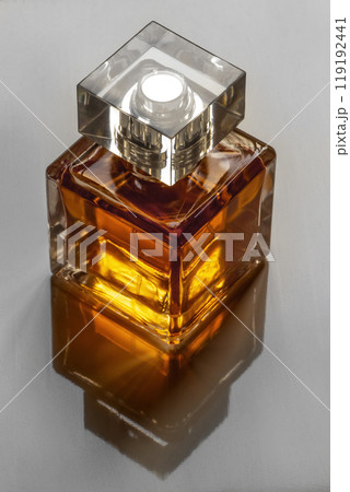 A small bottle of perfume 119192441