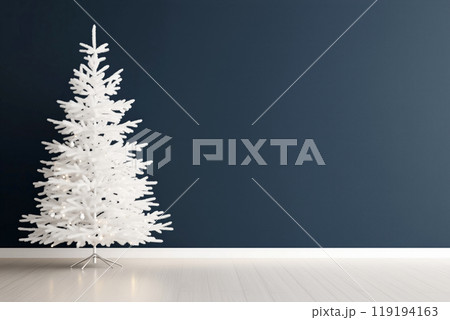 White Christmas tree stands elegantly in bright room with a rich blue wall, creating cheerful holiday atmosphere 119194163