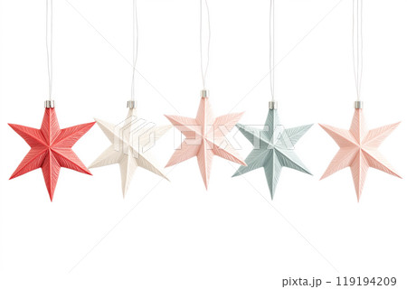 Decorative white Christmas stars with golden accents and fairy lights on white background. Festive holiday decor concept Decorative white Christmas stars with golden accents and fairy lights on white background. Festive holiday decor concept 119194209