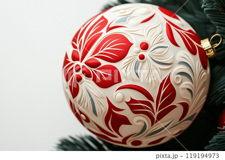 Beautiful Christmas ornaments with intricate red and white designs on white background. Concept of holiday decoration 119194973