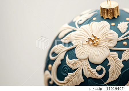 Beautiful Christmas ornaments with intricate blue and white designs on white background. Concept of holiday decoration 119194974