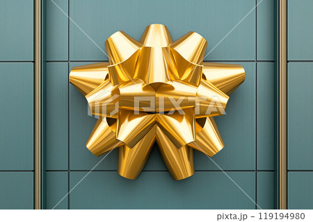 A large golden gift bow displayed on a teal wall background, symbolizing celebration A large golden gift bow displayed on a teal wall background, symbolizing celebration 119194980
