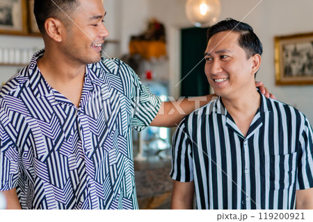 Two Friends Enjoying a Lively and Engaging Conversation in a Cozy Cafe Setting Two Friends Enjoying a Lively and Engaging Conversation in a Cozy Cafe Setting 119200921