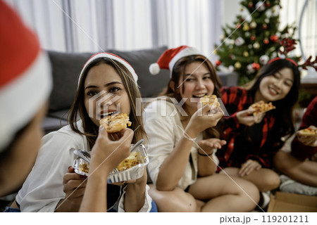 asian woman fed male friend christmas party asian woman fed male friend christmas party 119201211