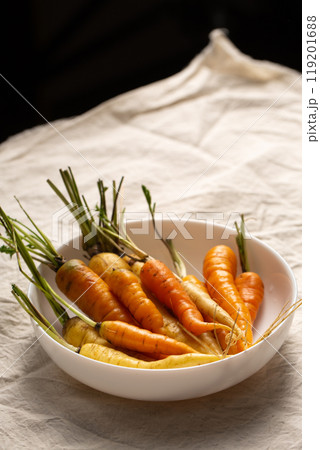 A bunch of colorful organic carrots 119201688