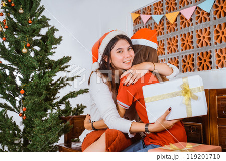 Experience the Joyful and Cheerful Holiday Embrace with a Christmas Tree and Gifts Experience the Joyful and Cheerful Holiday Embrace with a Christmas Tree and Gifts 119201710