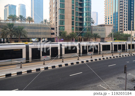 Dubai, United Arab Emirates - September 27, 2024 Dubai public transport tram on the street of the city. Editorial Dubai, United Arab Emirates - September 27, 2024 Dubai public transport tram on the street of the city. Editorial 119203184