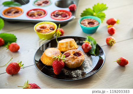 Sweet curd muffins with strawberry filling Sweet curd muffins with strawberry filling 119203383