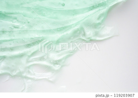 Transparent clear green liquid serum gel cosmetic texture background Transparent clear green liquid serum gel cosmetic texture background 119203907