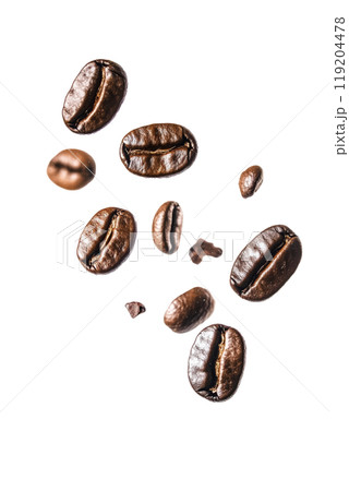 Coffee beans in mid-air showcasing their rich color and texture against a plain backdrop 119204478