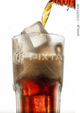 chilled cola pouring into glass 119205306
