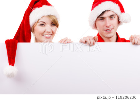 Couple with blank empty banner board. Christmas 119206230