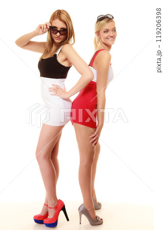 two sexy crazy women in summer clothes sunglasses. two sexy crazy women in summer clothes sunglasses. 119206398